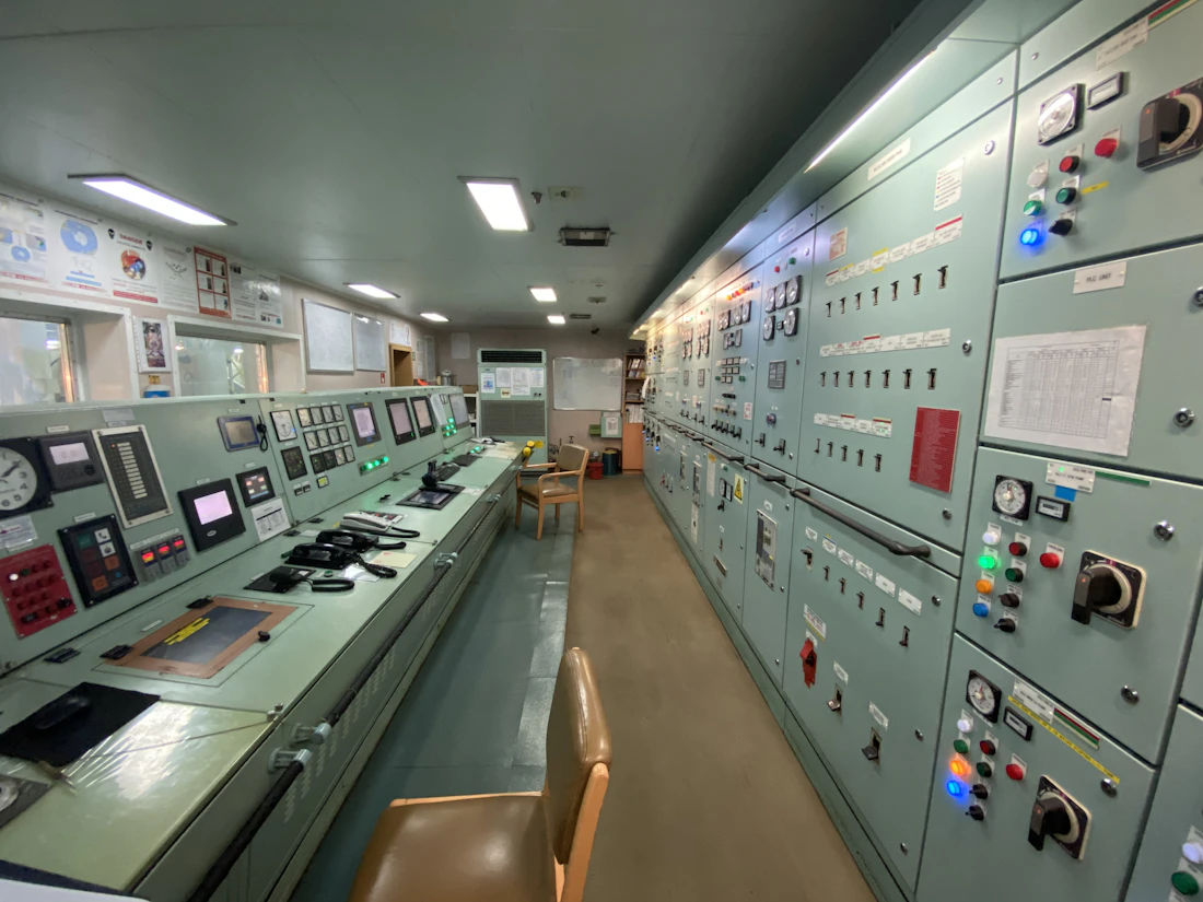 Marine control room with monitoring systems and electrical panels